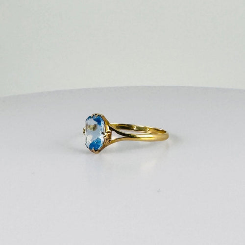 Bague Bague vintage en or jaune 14 carats avec topaze bleue 58 Facettes 2508021