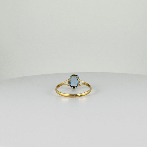 Bague Bague vintage en or jaune 14 carats avec topaze bleue 58 Facettes 2508021