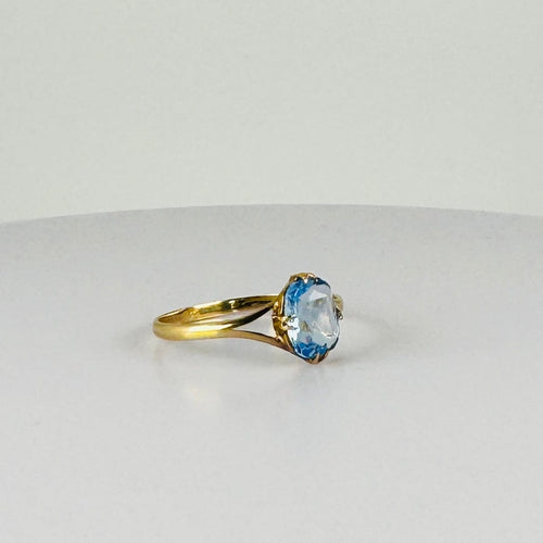 Bague Bague vintage en or jaune 14 carats avec topaze bleue 58 Facettes 2508021