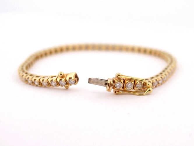Bracelet Mauboussin Tu es ma rivière d'amour - Bracelet en or jaune 18k et diamants 2 ct 58 Facettes 272530