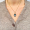 Pendentif Pendentif vintage en or rose 18 carats et topaze bleue 58 Facettes 2509003