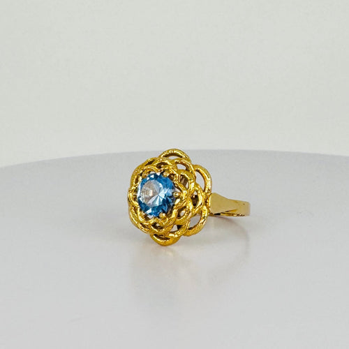 Bague Bague vintage en or 18k avec topaze bleue 58 Facettes 2509004