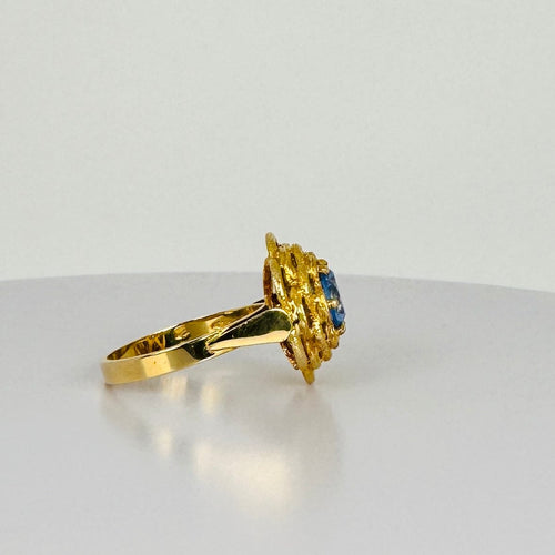 Bague Bague vintage en or 18k avec topaze bleue 58 Facettes 2509004