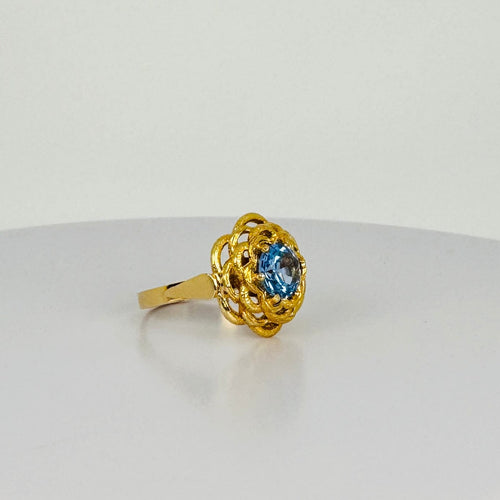 Bague Bague vintage en or 18k avec topaze bleue 58 Facettes 2509004