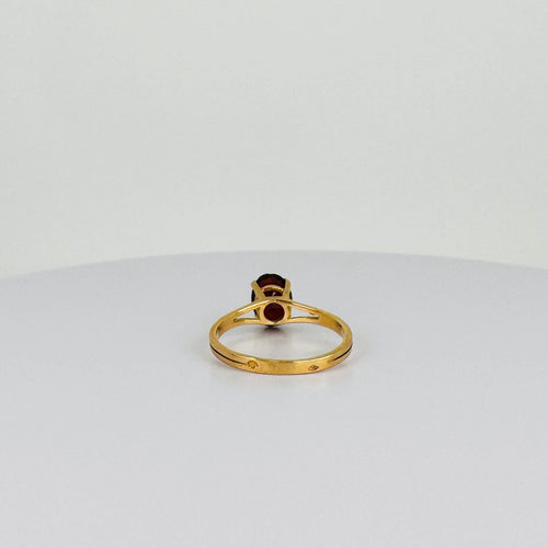 Bague Bague solitaire vintage en or 18k avec grenat ovale 58 Facettes 2508017