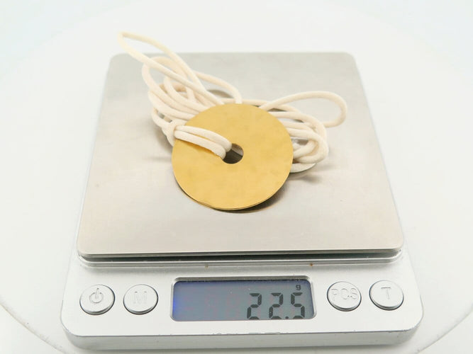 Collier Dinh Van - Collier pendentif Pi 40 mm en or jaune 24k martelé 58 Facettes 271154