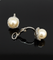 Boucles d'oreilles Boucles d’oreilles en or blanc avec perles et diamants 58 Facettes