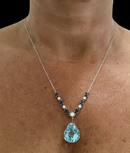 Collier Collier pendentif vintage en or blanc 18 carats avec aigue-marine, diamants et saphirs 58 Facettes