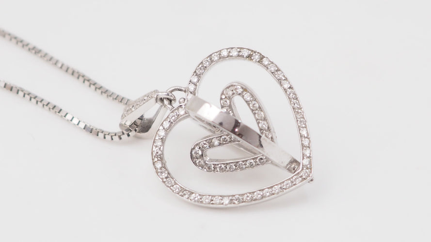 Collier Collier pendentif multi-cœurs en or blanc 18 ct et diamants 58 Facettes 21089