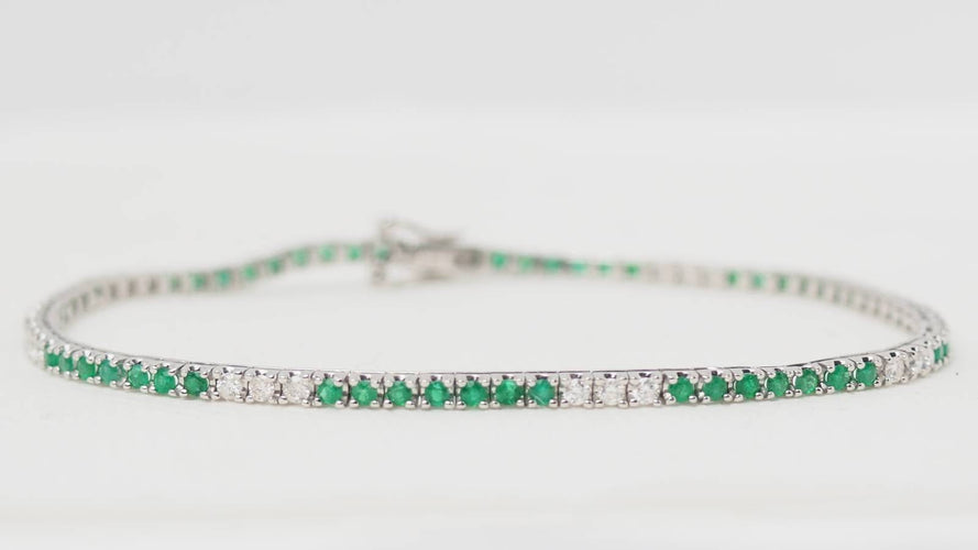 Bracelet 18cm Bracelet rivière en or blanc 18 kt, émeraudes et diamants 58 Facettes 32238