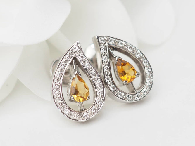 Boucles d'oreilles Boucles d'oreilles en or blanc 18 ct, citrines et diamants 58 Facettes 32804 b