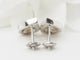 Boucles d'oreilles Boucles d'oreilles en or blanc 18 ct, citrines et diamants 58 Facettes 32804 b