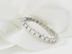 Bague 53 Alliance américaine en or blanc 18 kt et diamants 0,75 ct 58 Facettes 33427