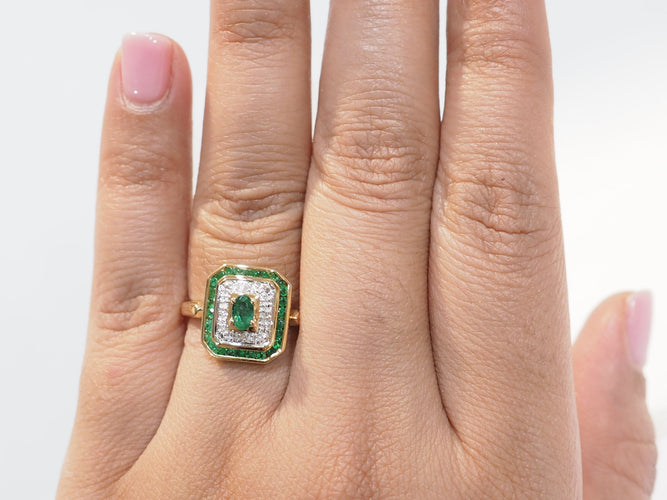 Bague en or jaune 18 ct avec émeraudes et diamants
