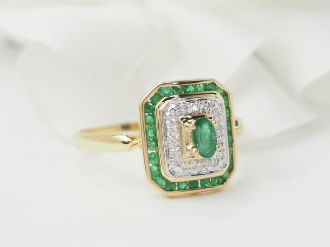 Bague en or jaune 18 ct avec émeraudes et diamants