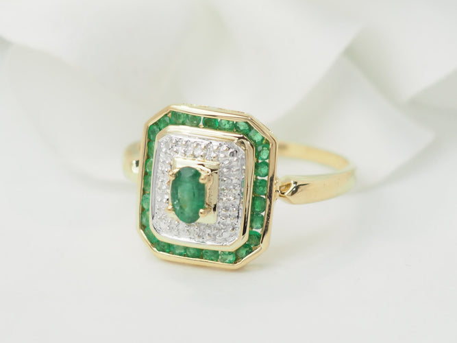 Bague en or jaune 18 ct avec émeraudes et diamants