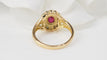 Bague 53 Bague marguerite en or jaune 18 ct, rubis et diamants 58 Facettes 32917