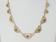 Collier Collier draperie fin XIXe siècle en or jaune 18 kt 58 Facettes 33486