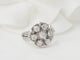 Bague 50 Bague marguerite en or blanc 18 kt et diamants 58 Facettes 33515
