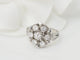 Bague 50 Bague marguerite en or blanc 18 kt et diamants 58 Facettes 33515