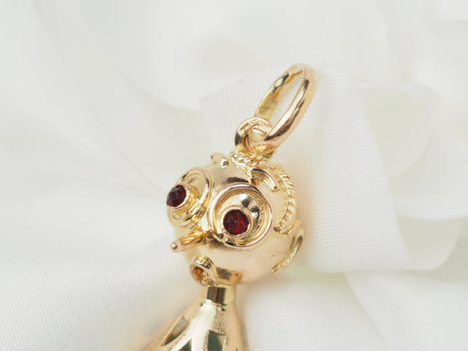 Pendentif Pendentif breloque figurine en or jaune 18 ct et turquoise 58 Facettes 33336