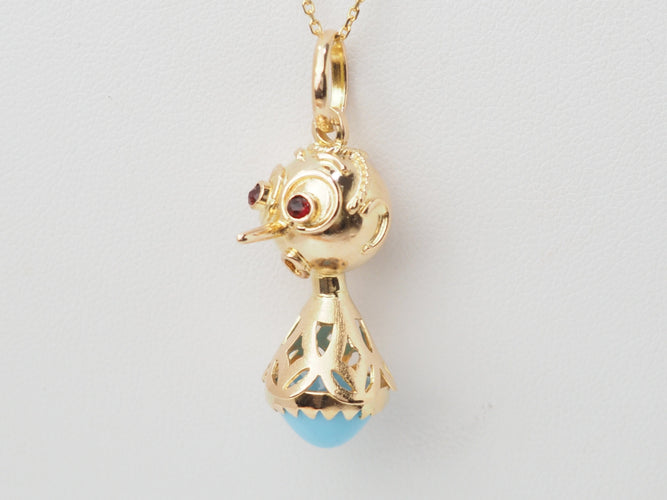 Pendentif Pendentif breloque figurine en or jaune 18 ct et turquoise 58 Facettes 33336