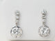 Boucles d'oreilles Paire de dormeuses anciennes en or blanc 18 ct et diamants 58 Facettes 32108