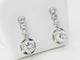 Boucles d'oreilles Paire de dormeuses anciennes en or blanc 18 ct et diamants 58 Facettes 32108