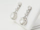Boucles d'oreilles Paire de dormeuses anciennes en or blanc 18 ct et diamants 58 Facettes 32108