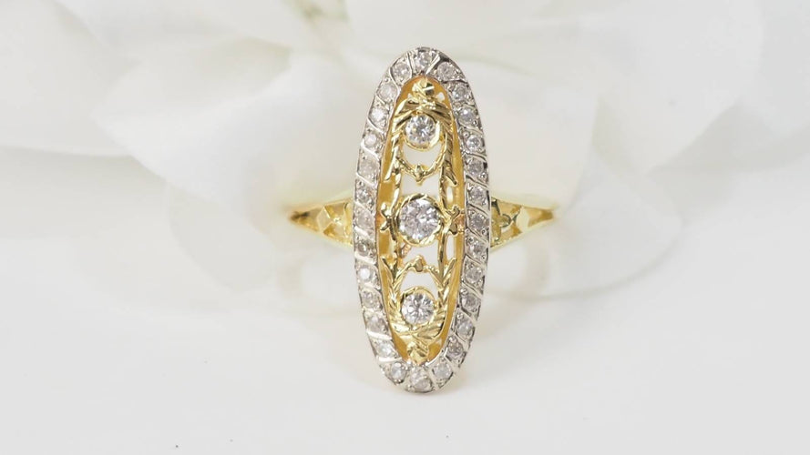 Bague 59.5 Bague marquise en or jaune et blanc 18 ct et diamants 58 Facettes 33010