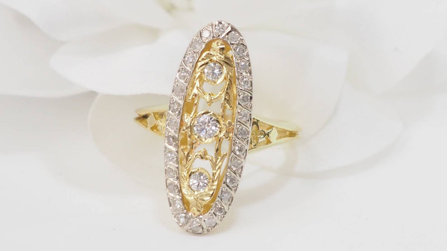 Bague 59.5 Bague marquise en or jaune et blanc 18 ct et diamants 58 Facettes 33010