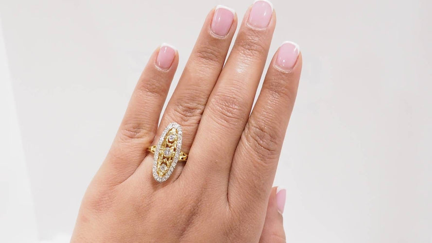 Bague 59.5 Bague marquise en or jaune et blanc 18 ct et diamants 58 Facettes 33010