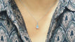 Collier Collier solitaire en or blanc 18 kt et topaze bleue 58 Facettes CLAL