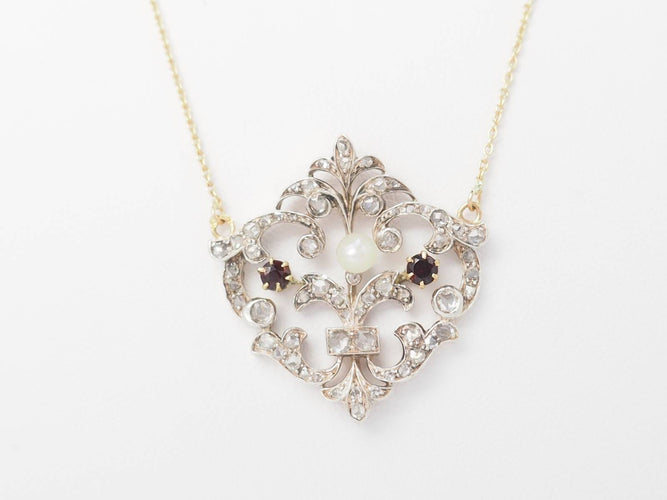 Collier Collier volutes en or jaune 18 ct, argent, diamants, grenats et perle 58 Facettes 33049