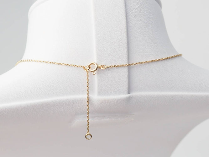 Collier Collier volutes en or jaune 18 ct, argent, diamants, grenats et perle 58 Facettes 33049