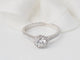 Bague 53.5 Bague solitaire en or blanc 18 kt et diamants 58 Facettes 30712/30923