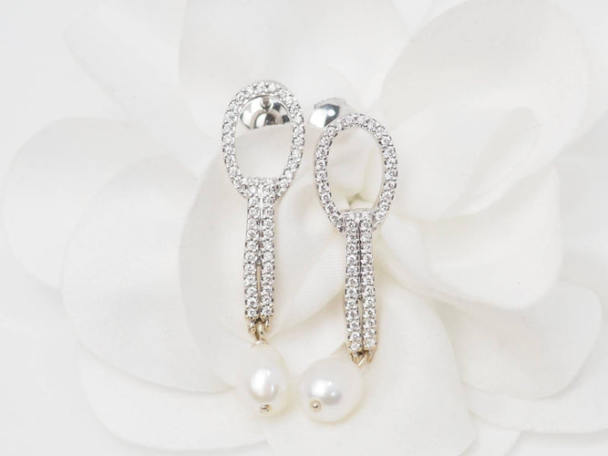 Boucles d'oreilles Boucles d’oreilles pendantes en or blanc 18 ct, diamants et perles de culture 58 Facettes 33102