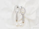 Boucles d'oreilles Boucles d’oreilles pendantes en or blanc 18 ct, diamants et perles de culture 58 Facettes 33102