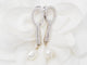 Boucles d'oreilles Boucles d’oreilles pendantes en or blanc 18 ct, diamants et perles de culture 58 Facettes 33102