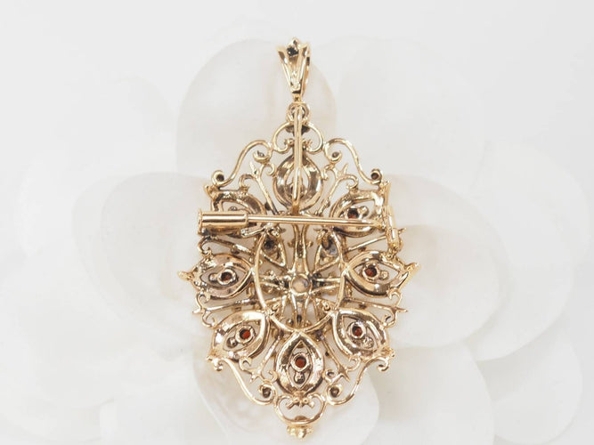 Pendentif Broche pendentif en or jaune 18 ct, émeraude, grenats et perles 58 Facettes 33147