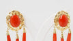 Boucles d'oreilles Boucles d’oreilles pendantes en or jaune 18 ct et corail 58 Facettes 32382