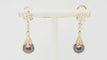 Boucles d'oreilles Boucles d’oreilles pendantes en or jaune 18 ct, diamants et perles de Tahiti 58 Facettes 32802