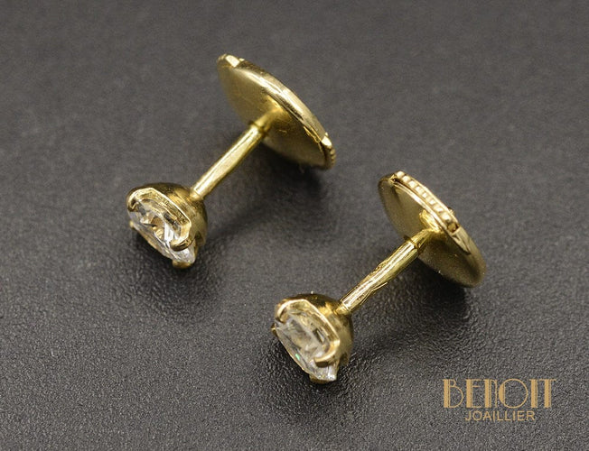 Boucles d'oreilles Boucles d'oreilles puces en or jaune et diamants 58 Facettes A10509
