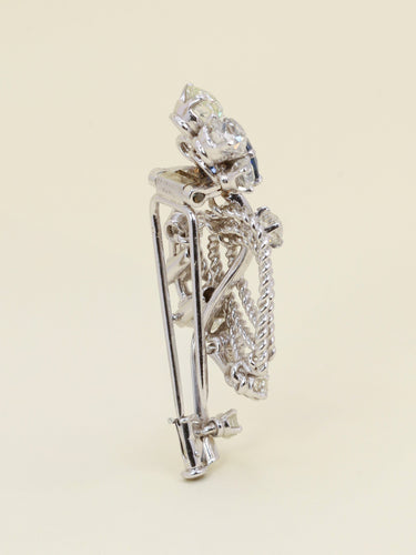 Broche Mauboussin - Broche fleur en or blanc 18k saphir et diamants 58 Facettes 342