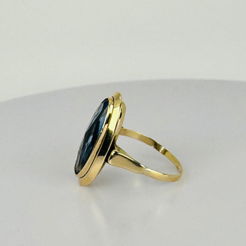 Bague Bague vintage en or jaune 14 carats et topaze bleue 58 Facettes 2512021