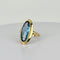 Bague Bague vintage en or jaune 14 carats et topaze bleue 58 Facettes 2512021