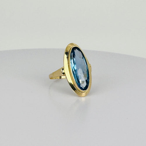 Bague Bague vintage en or jaune 14 carats et topaze bleue 58 Facettes 2512021