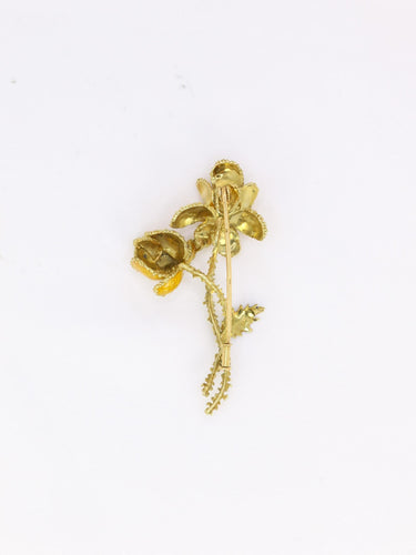 Broche Broche fleur vintage années 1970 en or jaune 18 carats et émail 58 Facettes 998