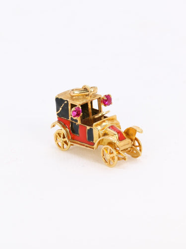 Pendentif Pendentif charm voiture ancienne en or jaune 18 carats, rubis synthétiques et émail 58 Facettes 1099.21