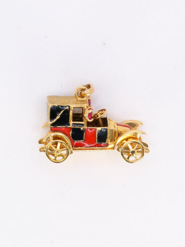 Pendentif Pendentif charm voiture ancienne en or jaune 18 carats, rubis synthétiques et émail 58 Facettes 1099.21